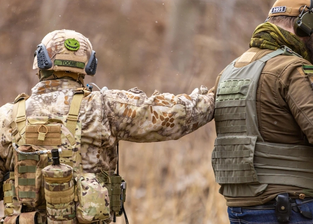 Airsoft players in tactical gear